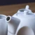 Import Custom porcelain teapot set tea cup set ceramic tea pot with bamboo tray from China