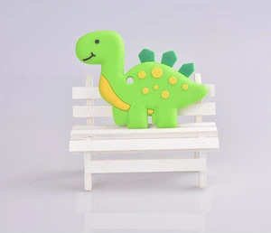 Cute Funny Cartoon Silicone Baby Teether With Dinosaur Shape Silicone Rubber Rod For Baby Use