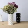 Elegant textured effect ceramic decorative vase without glaze