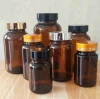 Empty glass pill amber container medicine drug vitamin capsule supplements cream cosmetic bottle