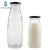 Import High Capacity 500ml Glass Milk Bottle with Metal Lids from China