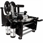 High Efficiency Manual Labeling Machine For Round Bottles/10mm Bottle Sticker Labeling Machine For Cylindrical Products