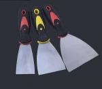 Paint scraper with rubber handle, mirror polished blade