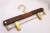 Import Top quality Luxury Craft Antique Wooden Suit Coat Hangers Clothes Rack Gold Hook from China