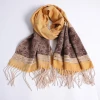 Women are selling soft cashmere long scarf shawls wrapped in winter scarves with thick shawls