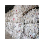 HDPE milk bottle scrap available in various grades for industrial use