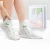 Import Amazon Ebay OEM/ODM Rose Chamomile Feet Peeling Heel Dead Rough Skin Remover Peel Spa Socks Exfoliating Calluses Foot Mask from China