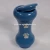Import Best selling ceramics bone shape pet urns casket with hand paint paw mark for pets ashes with cover from China
