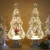 Import Clear led sparkling water inside revolving christmas tree top star acrylic led light with golden base holiday decoration from China