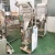 Import DZD-320B 10-500g Universal Vertical Small Parts Food Grain Powder Tea Packaging Machine Automatic from China