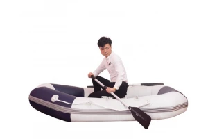Factory supply cheap inflatable kayak fishing canoe rowing boat with paddles on sea for sale