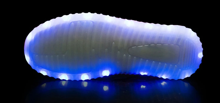Fashion sneakers with LED light in the sole lighting sneakers