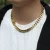 Import hip hop iced out 8mm 10mm 12mm smooth spring buckle Cuban chain stainless steel cuban link chain necklace from China