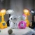 Import lovely cartoon LED book lamp for reading, custom made cartoon book light, mini cartoon shape desk lamp for kids from China