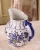 Import Underglazed eco friendly blue and white ceramic vase for home decor from China