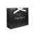 Import Wholesale Packaging Black Foiled Luxury Gift White Shopping paper Bags With Embossing from China