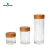 Import 500ml kitchen furniture clear Medium round cylinder bottles candy food container glass jar with screw bamboo lid from China