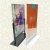 Import A4 acrylic metal base Door Window Screens store display Spa Tubs Sauna Rooms poster stand Mushroom Stone sign holder from China