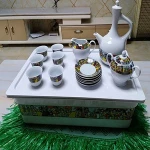 Coffee tray of rekebot for Ethiopian Eritrean Coffee ceremony with saba and tilet designs