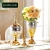 Import High quality handicraft home decorative glass vase with lid from China