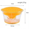 kitchen gadgets 2021 plastic hand press portable multipurpose fresh vegetable fruit squeezer manual orange lemon juicer