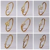 Simple design best sale heart shape zircon paved cable bangle bracelet wholesale for unisex