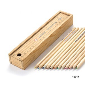 Wooden ruler with color pencil in cuboid wooden set