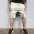 Import Custom Logo Sportswear Solid Color Knee-length Pants Zip Pocket Elastic Cargo Shorts Multi-pocket Mens Casual Shorts from China