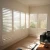 Import Custom white indoor wood window blinds folding plantation window shutters from China