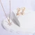 Import High Quality Fashion Design  Ice Out Zircon Stone Flower Hoop Earring Pendant Copper Jewelry Set Party Wedding For Women from China