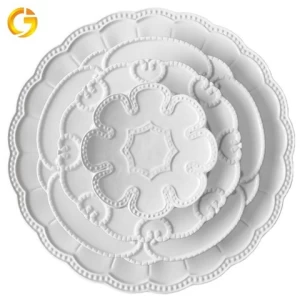 JINTCH Wholesale white ceramic engraving flat starter plate dishes embossed porcelain plates for wedding