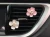 Import metal alloy plum blossom shaped 3d car air freshener vent clip various sents from China