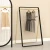 Import OUJIA Black Metal Clothing Hanging Rack Stainless Steel Garment Display Stand Retail Shop Fixture from China