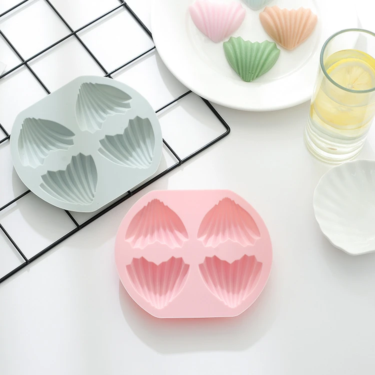 Spot hot sale 4 even heart-shaped madeleine cake mold baking household small love heart-shaped net celebrity non-stick silicone