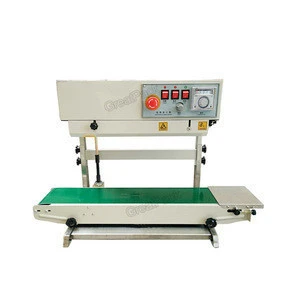 Vertical continuous band sealer plastic pouch sealing machine