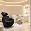Modern Integrated Black Shampoo Chair Curved All-inclusive PU Leather Hair Washing Chair With Glossy Ceramic Sink For B