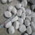 Import Natural Snow White Stone White Cobbles Pebbles Flat River Stone from China