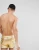 Import 2018 OEM custom men swimwear clothing 100%polyester runner swim shorts in gold from China