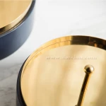 Deep blue ceramic decorative storage jar with stainless steel lid for home decoration