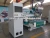 Import Economic 4 heads pneumatic tool changer cnc router with Vaccum Table from China