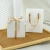 Import Flip Gift Boxes Essential Oil Book Shape Packaging Box Ring Earrings Necklace Jewelry Box With Ribbon from China