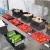 Import Fresh Mushroom Tray Fruit Filling Sealing Pepper Tomatoes Ginger Garlic Packaging Machine from China
