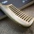 Import High quality handmade sandalwood wooden hair comb wholesale from China