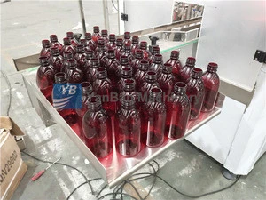 manufacturer glass pharmaceutical syrup filling juice bottle with labeling machine