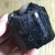 Import Natural rock jet stone rough aphrizite black tourmaline stone from China
