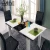 Import New modern designs dining set long glass dining table and chair fold dining sets from China