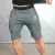 Import OEM custom made print embroidery sport gym mens shorts with pockets from China