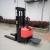 Import Pallet Truck Lift Stacker 2 Ton Electric Battery Forklift Used In Warehouse from China