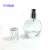 Import STOCK Elegant 25ml Oval Shape Clear Glass Perfume Bottle Refillable Pump Atomizer Bottle with Sprayer and Clear Caps from China