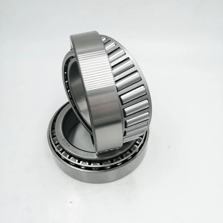 Tapered roller bearing 30215  door roller bearing